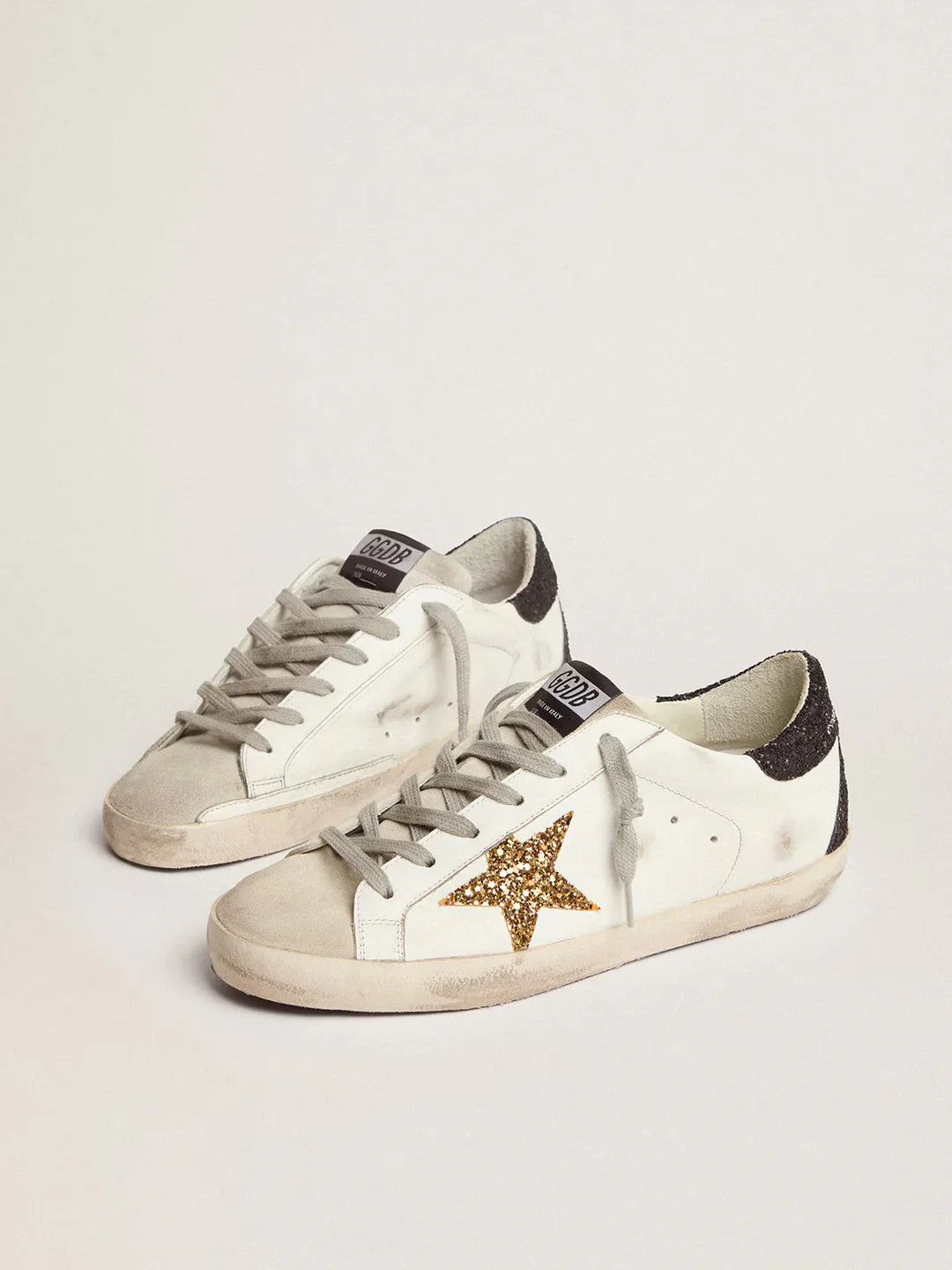 Super-Star femme en cuir nappa avec étoile à paillettes dorées et contrefort à paillettes noires