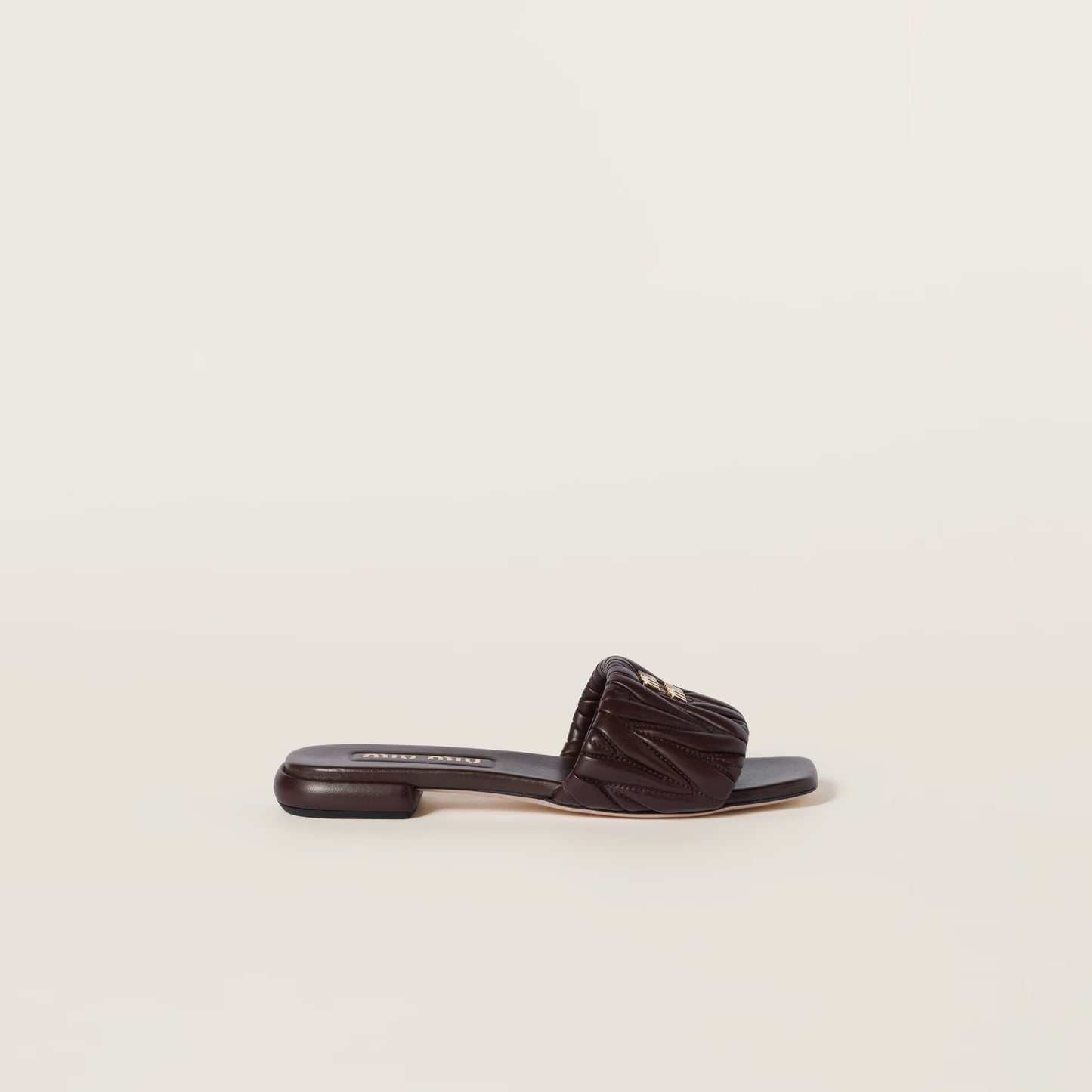 Mules en cuir nappa matelassé Bruyère