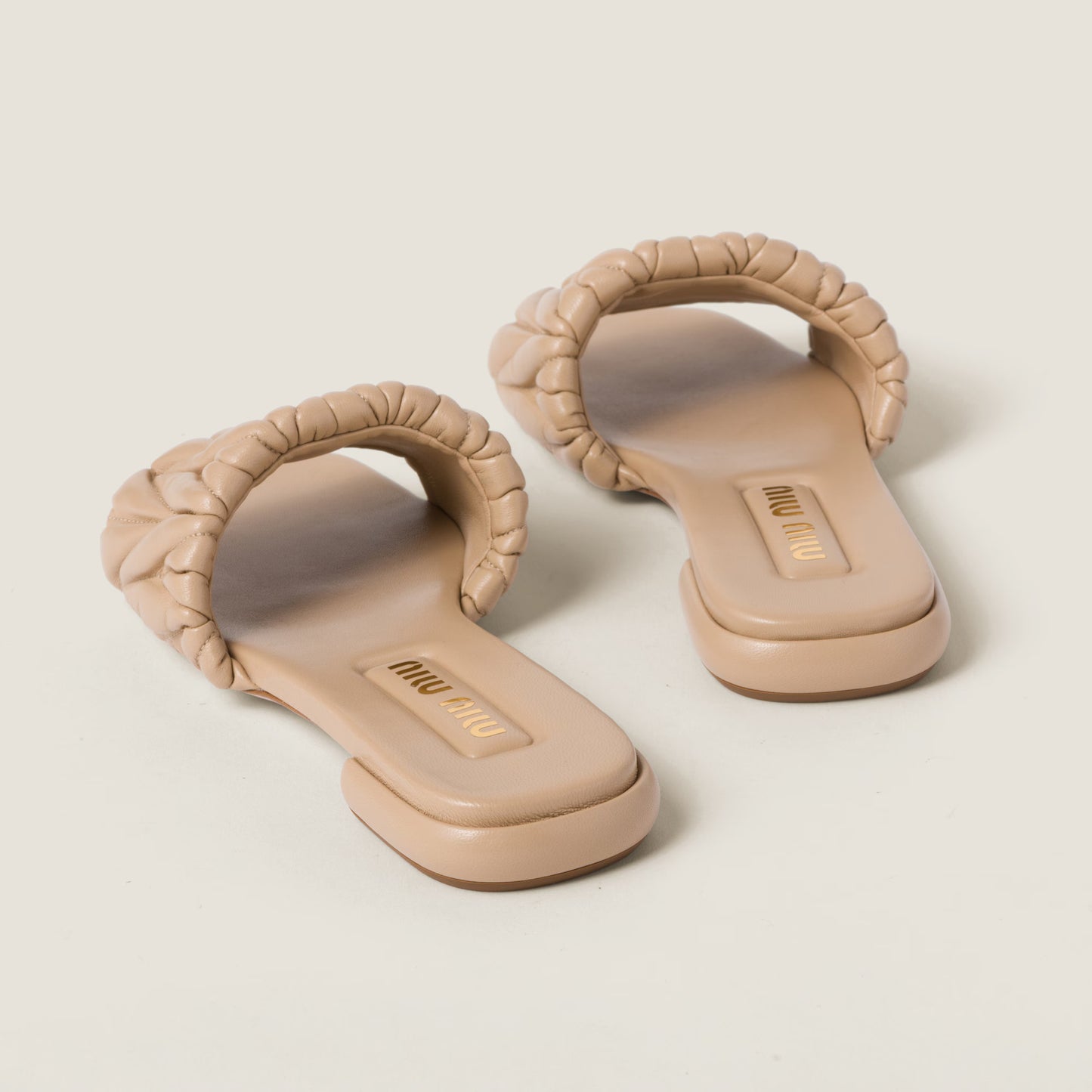 Mules en cuir nappa matelassé Beige Sable