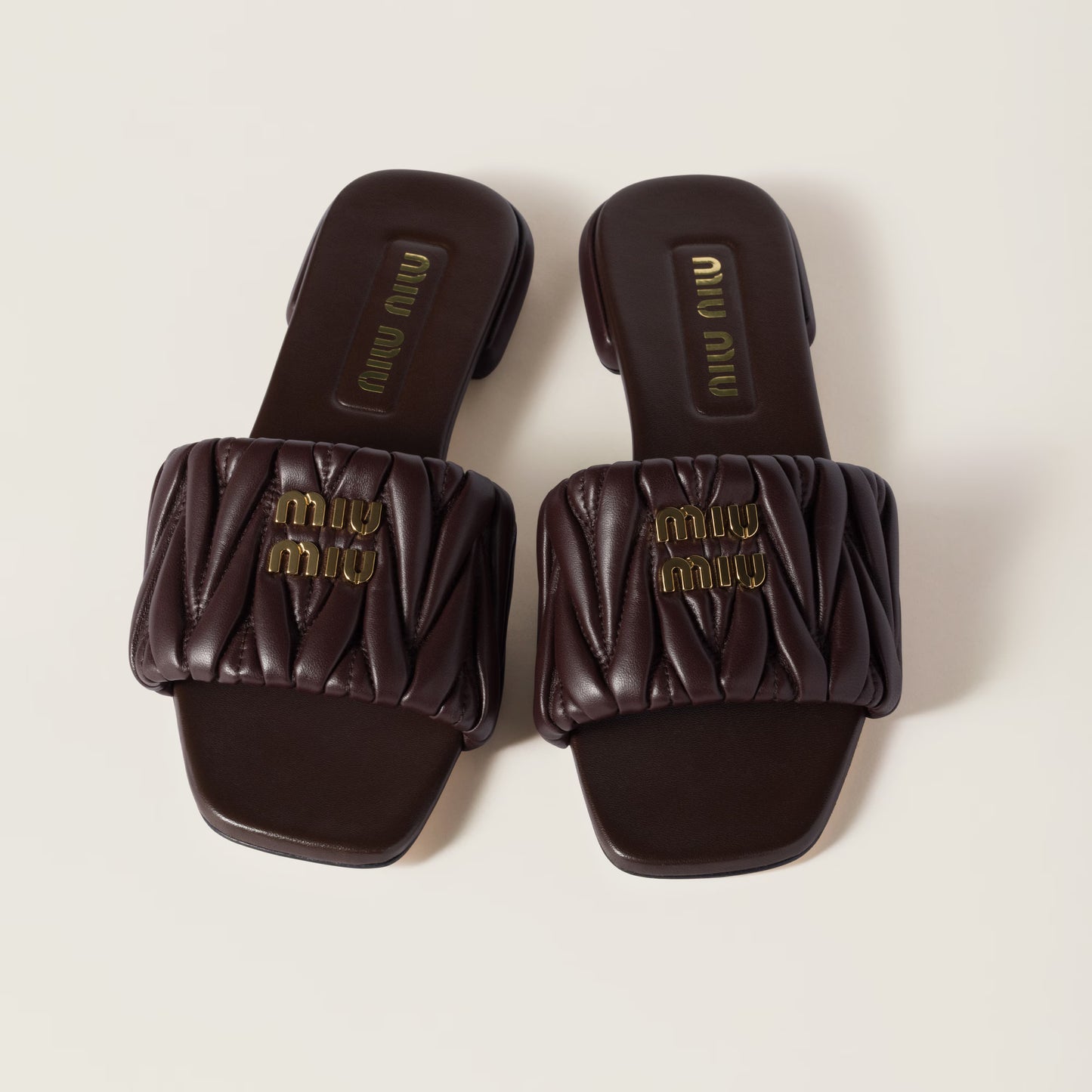 Mules en cuir nappa matelassé Bruyère