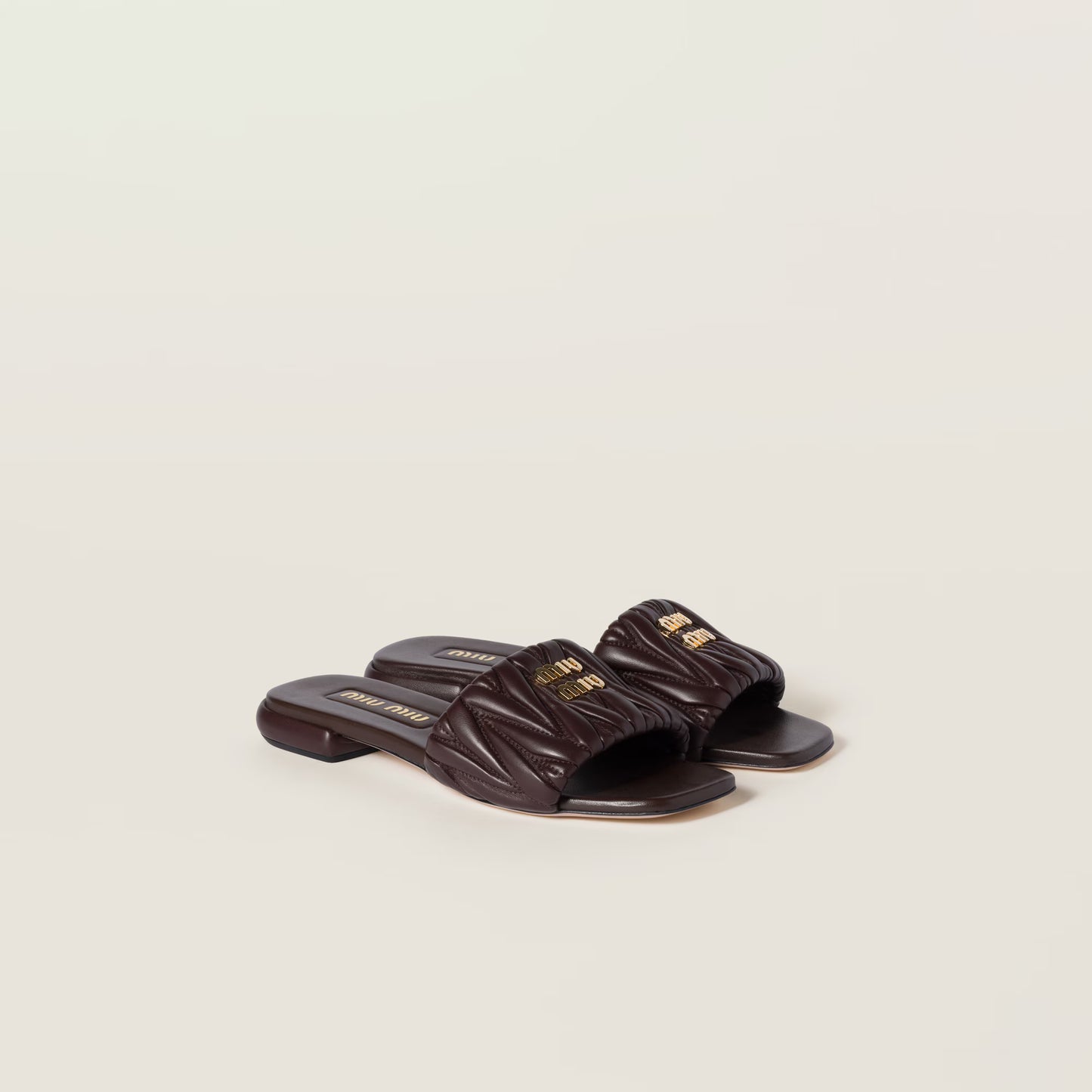 Mules en cuir nappa matelassé Bruyère