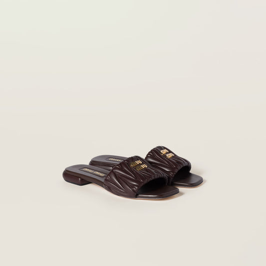 Mules en cuir nappa matelassé Bruyère